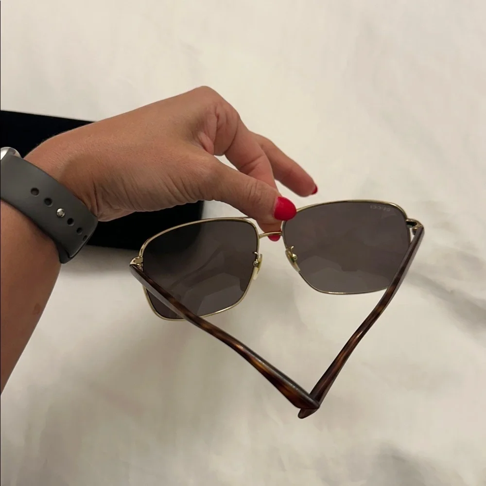Gucci Gold Frame Sunglasses with Dark Lenses